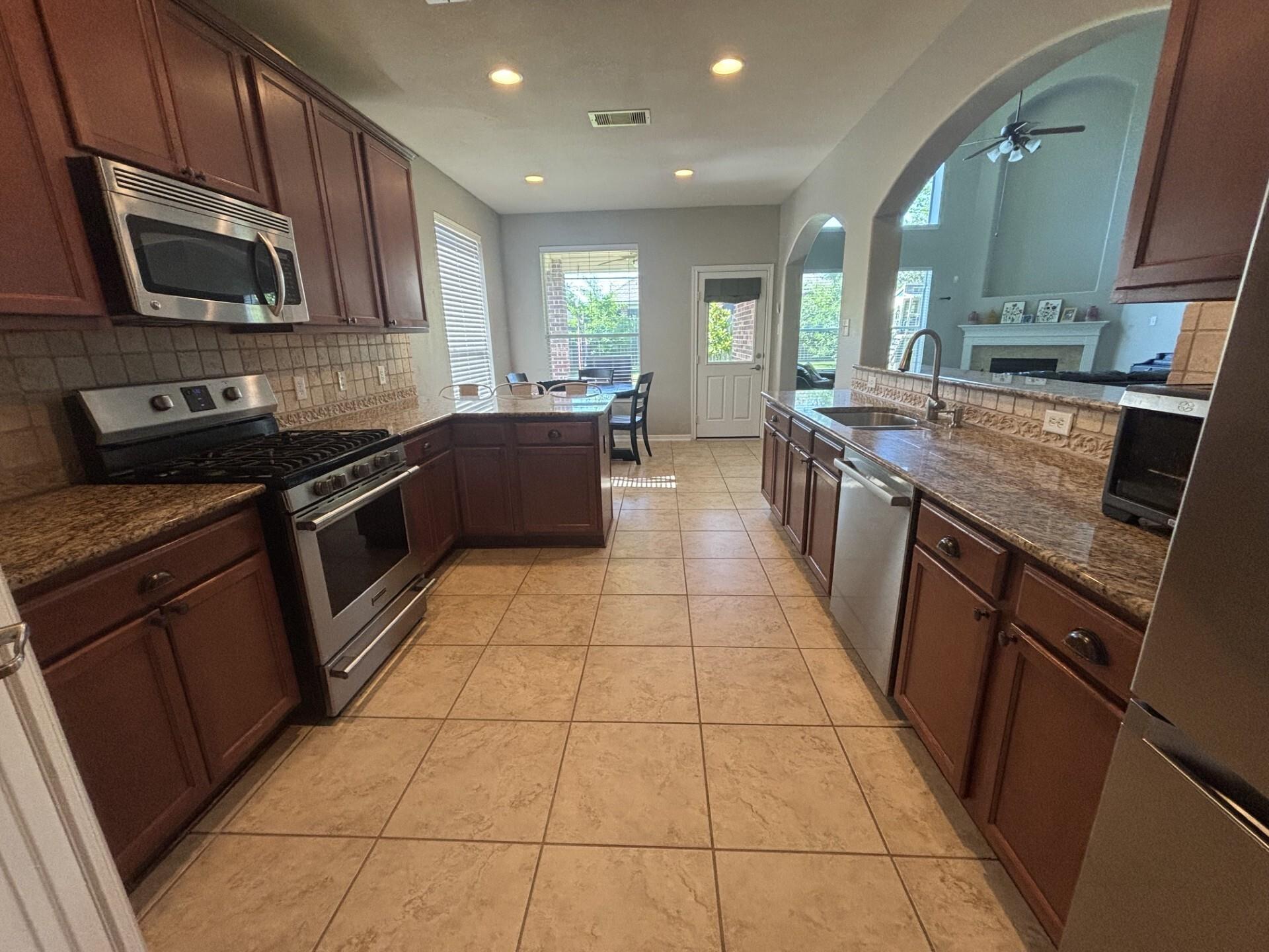 14907 Whispy Green Court