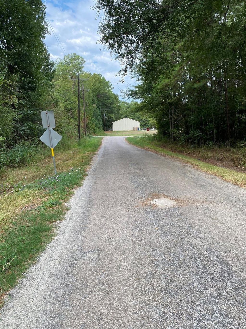 Photo of 0 County Road 3812, Cleveland, TX 77327 (MLS # 2077074)