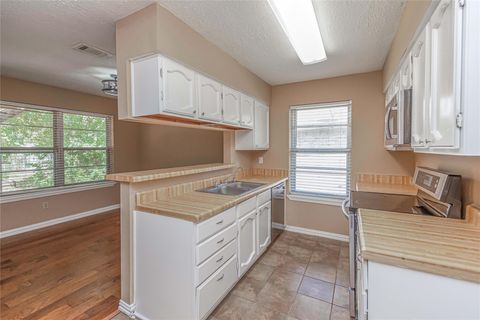 Photo of 16778 Gleneagle Drive N, Conroe, TX 77385 (MLS # 60270344)