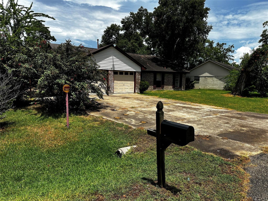 Photo of 205 Honeysuckle Drive, Baytown, TX 77520 (MLS # 87402370)