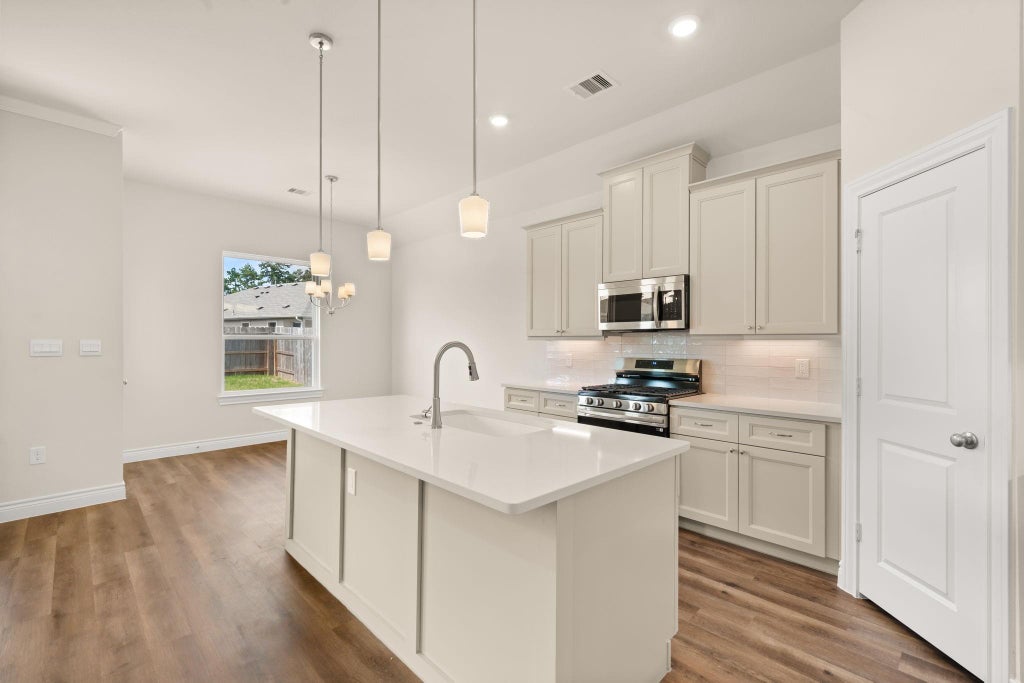 Photo of 10320 Woodhill Spa Lane, Cleveland, TX 77327 (MLS # 31637233)