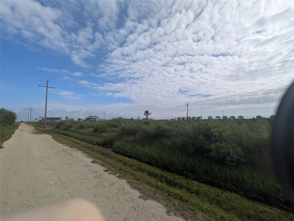 Photo of 1102 Gulf Supply Road, Gilchrist, TX 77617 (MLS # 67650222)