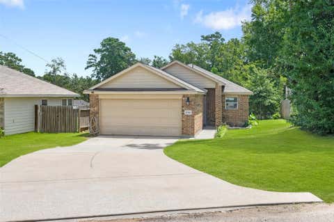Photo of 15302 Kickapoo Trail, Willis, TX 77378 (MLS # 76222501)