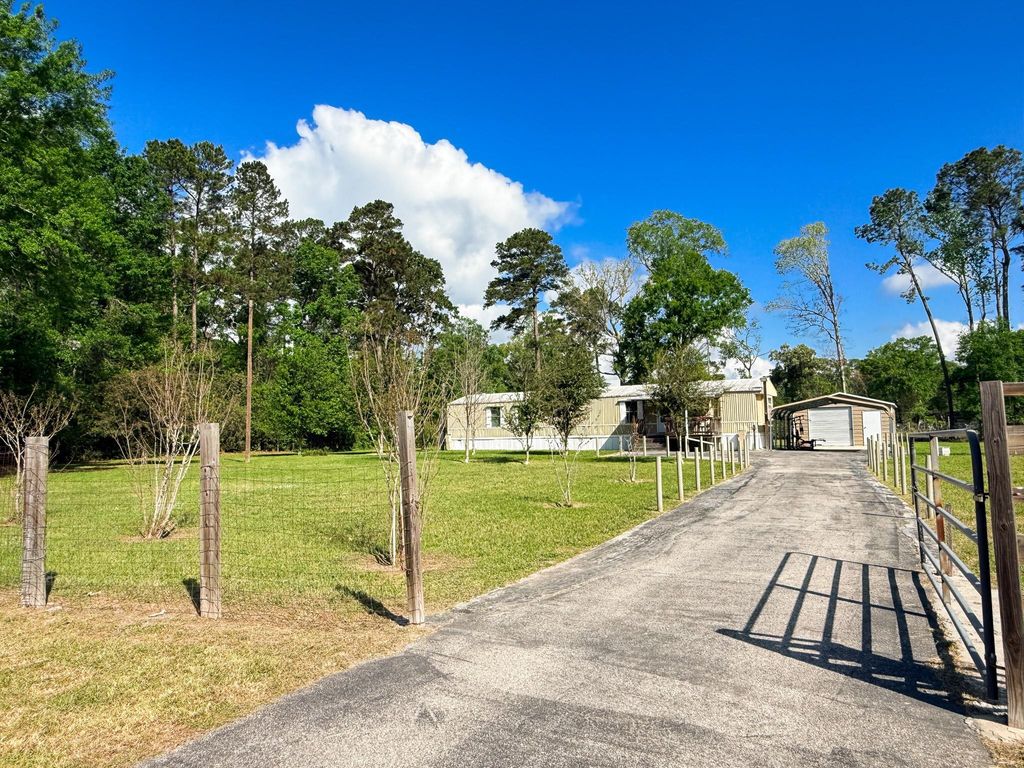 Photo of 20177 Ranch Estates Drive, New Caney, TX 77357 (MLS # 74830959)