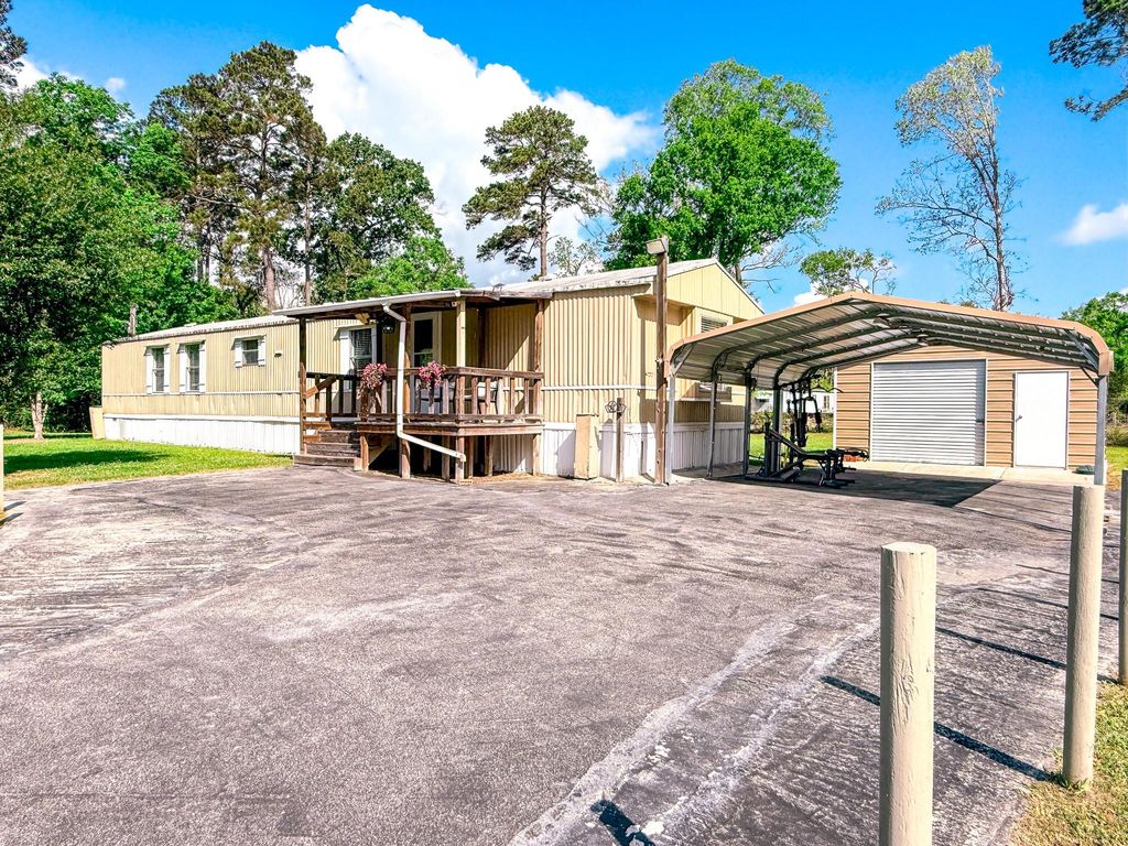 Photo of 20177 Ranch Estates Drive, New Caney, TX 77357 (MLS # 74830959)