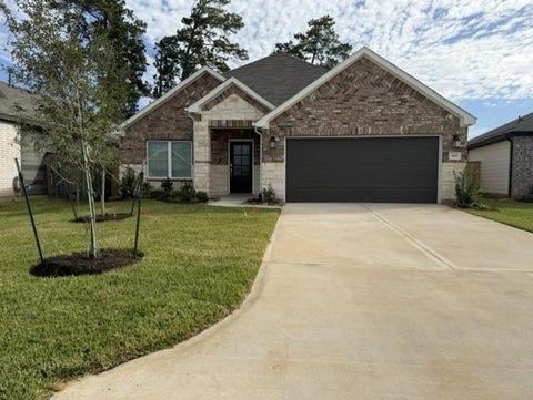 Photo of 985 Garden Path Drive, Willis, TX 77378 (MLS # 60820220)