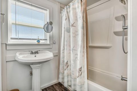 Tiny photo for 1018 Militia Drive, Surfside Beach, TX 77541 (MLS # 4769414)