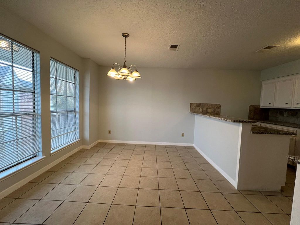 Photo of 11500 Meadow Lane #4, Houston, TX 77477 (MLS # 96915044)