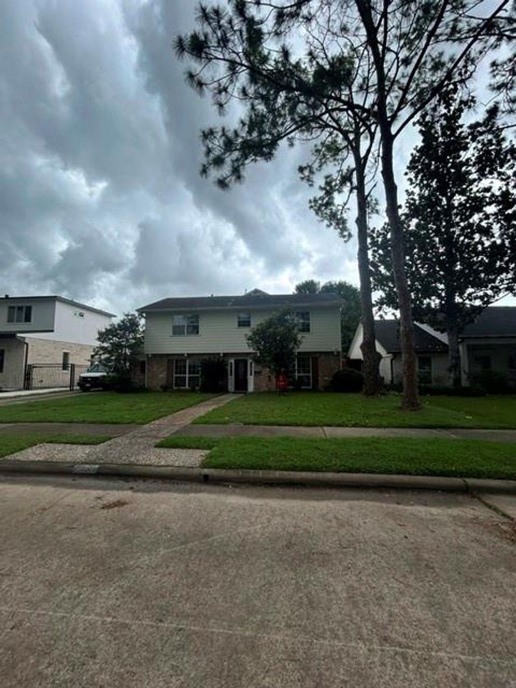 Photo of 12506 Mooremeadow Lane, Houston, TX 77024 (MLS # 20352670)