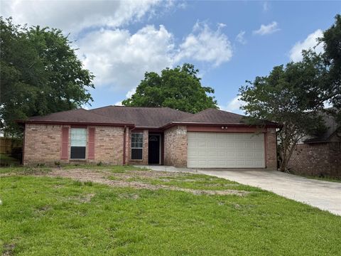 Photo of 13215 Lake Breeze Lane, Willis, TX 77318 (MLS # 48344267)
