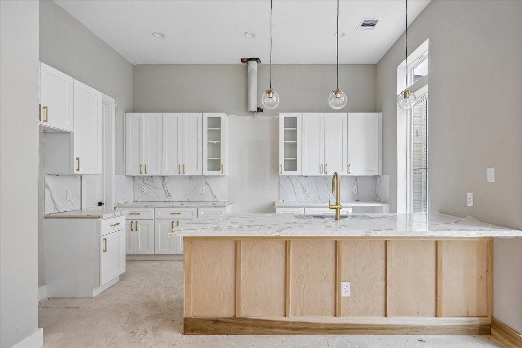 Photo of 1187 W 19th Street, Houston, TX 77008 (MLS # 79308786)