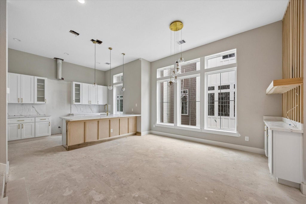 Photo of 1187 W 19th Street, Houston, TX 77008 (MLS # 79308786)