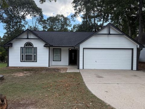 Photo of 10890 Royal Adrian Dr, Conroe, TX 77303 (MLS # 32573474)