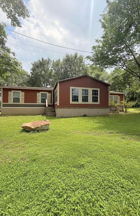 Photo of 9 Gambrell Road, Huntsville, TX 77320 (MLS # 42179406)