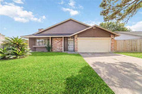 Photo of 5711 Longforest Drive, Houston, TX 77088 (MLS # 77067968)