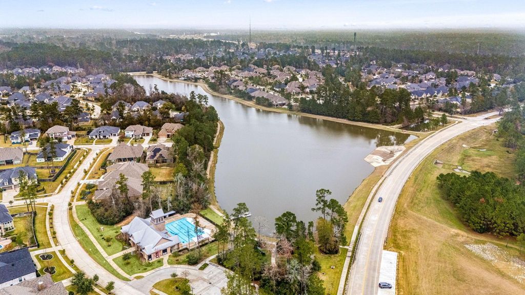 Photo of 734 Platinum Stone Lane, Pinehurst, TX 77362 (MLS # 71280415)