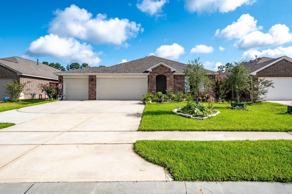 Photo of 21427 Sacred Grove St Street, New Caney, TX 77357 (MLS # 7778403)