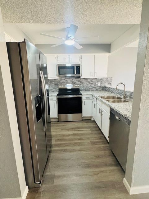 Photo of 12509 Newbrook Dr Drive #331, Houston, TX 77072 (MLS # 45470264)