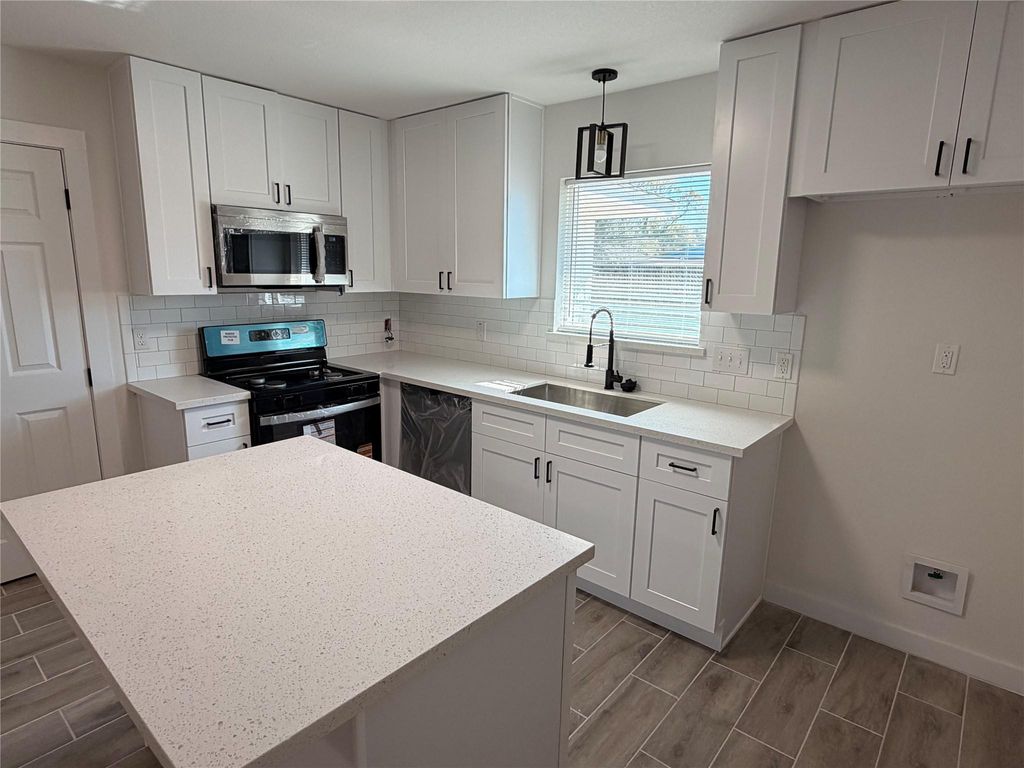 Photo of 5842 Beldart Street, Houston, TX 77033 (MLS # 19785622)