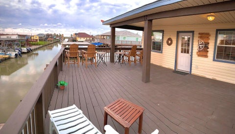 Photo of 215 Pompano Lane, Surfside Beach, TX 77541 (MLS # 97236366)