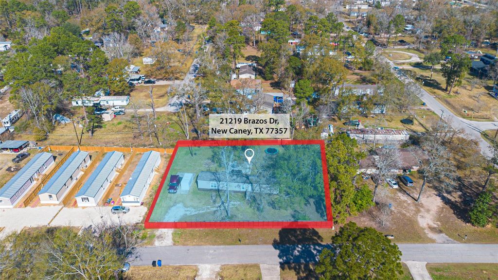 Photo of 21219 Brazos Drive, New Caney, TX 77357 (MLS # 26254868)