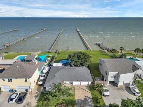 Photo of 8010 Ocean Drive, Beach City, TX 77523 (MLS # 33119227)