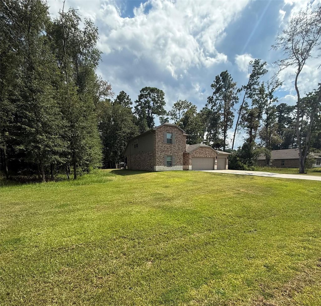 Photo of 2914 Roman Forest Boulevard, New Caney, TX 77357 (MLS # 25462483)