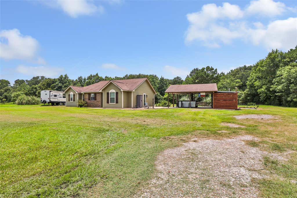 Photo of 1308 County Road 109, Devers, TX 77538 (MLS # 60238855)