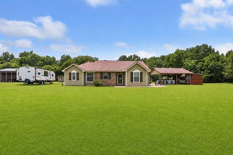 Photo of 1308 County Road 109, Devers, TX 77538 (MLS # 60238855)
