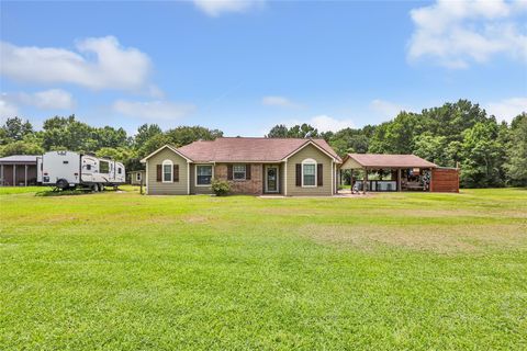 Photo of 1308 County Road 109, Devers, TX 77538 (MLS # 60238855)