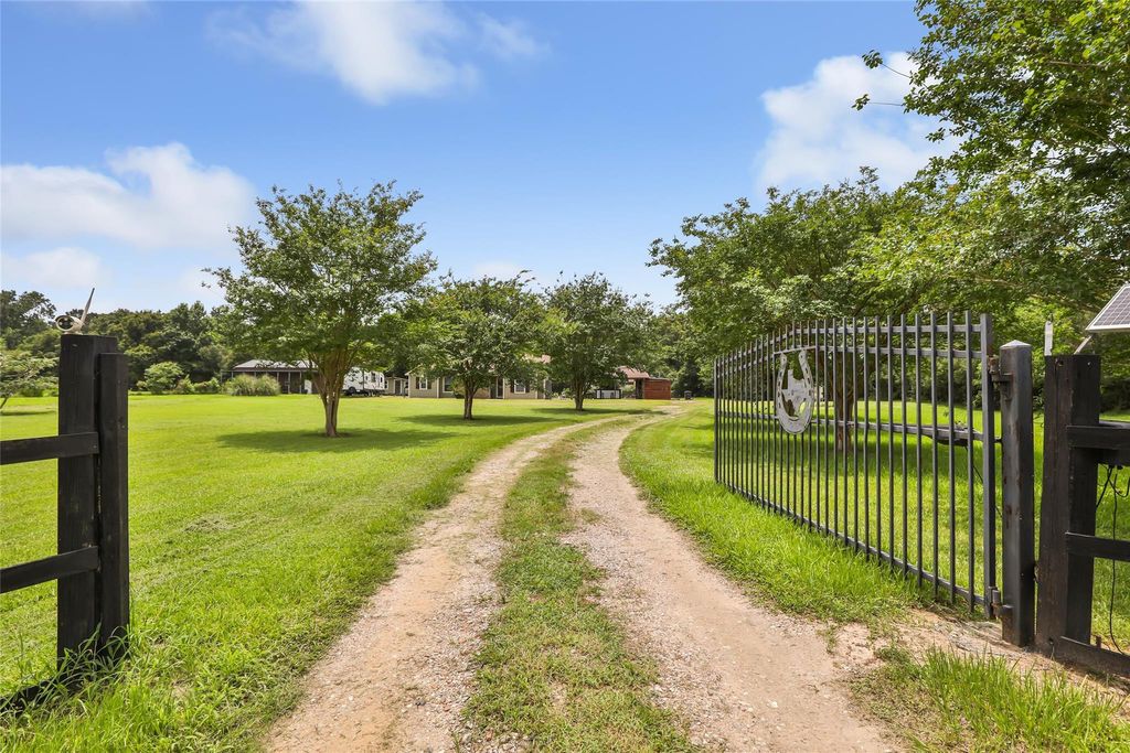 Photo of 1308 County Road 109, Devers, TX 77538 (MLS # 60238855)