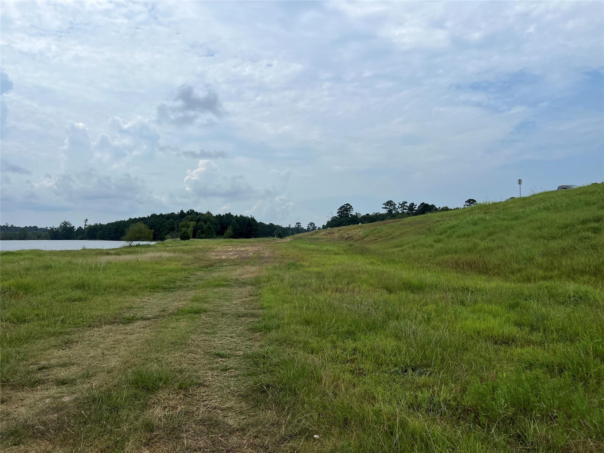 Property is to the Right of the Pond to the Hwy 105 Bypass