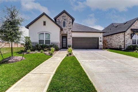 Photo of 1322 Village Falls Dr, Missouri City, TX 77459 (MLS # 10582898)