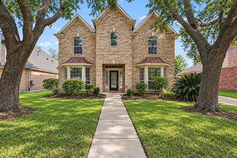 Photo of 8519 Colonial Falls Lane, Humble, TX 77396 (MLS # 64459199)
