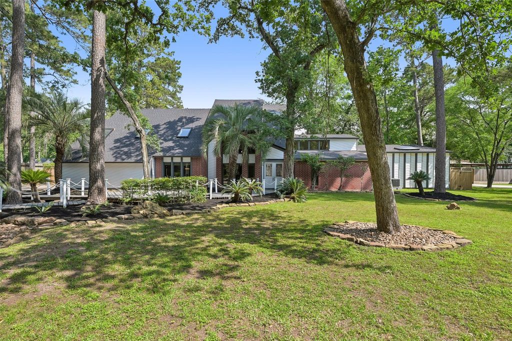 Photo of 1211 Golden Bear Lane, Kingwood, TX 77339 (MLS # 30897809)