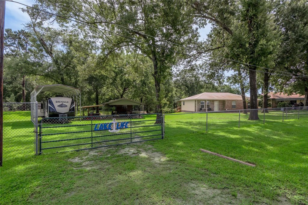 Photo of 405 Peacock Path, Trinity, TX 75862 (MLS # 38740994)