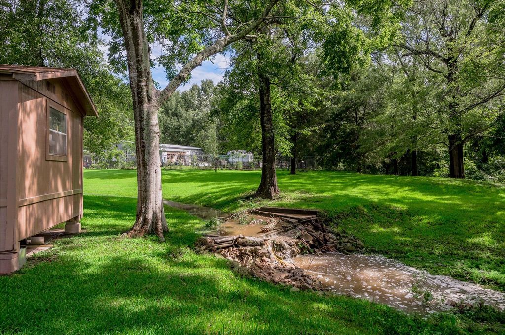 Photo of 405 Peacock Path, Trinity, TX 75862 (MLS # 38740994)