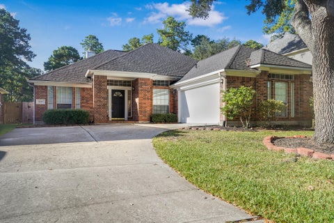 Photo of 1602 Summer Rain Drive, Houston, TX 77339 (MLS # 98685245)