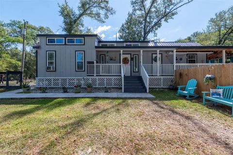 Photo of 664 Jensen Drive, Cleveland, TX 77327 (MLS # 28958112)