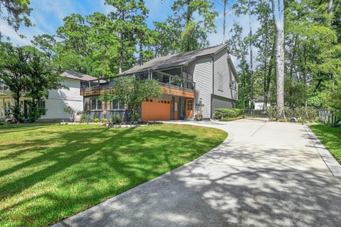 Photo of 15696 Lakeway Drive, Willis, TX 77318 (MLS # 14776305)