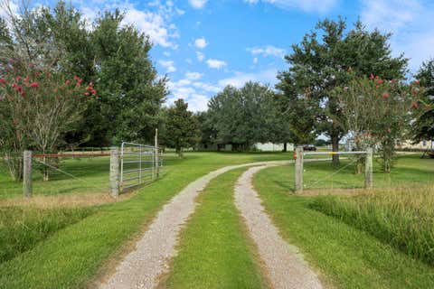 Photo of 15610 Penick Rd Rd, Waller, TX 77484 (MLS # 83552552)