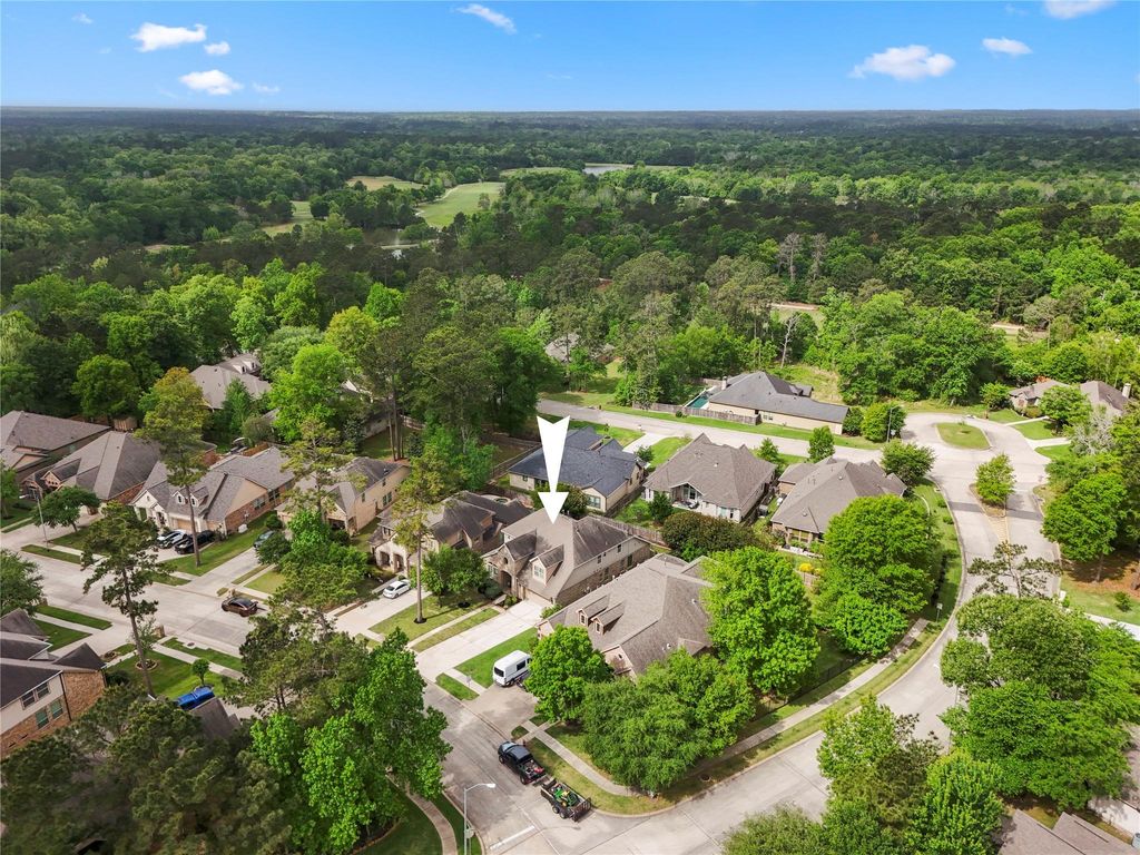 Photo of 4855 Bayou St John, Conroe, TX 77304 (MLS # 86445848)