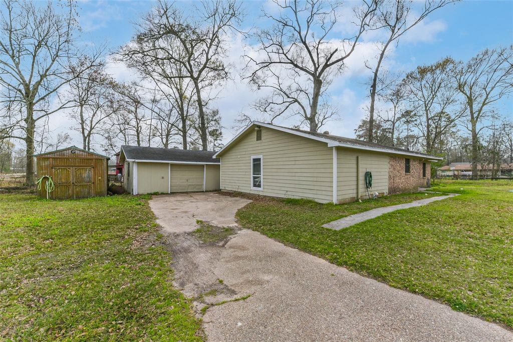 Photo of 26790 Burning Tree, New Caney, TX 77357 (MLS # 77388000)