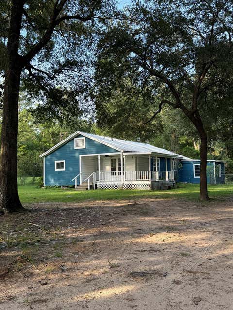 Photo of 311 Virginia Street, Shepherd, TX 77371 (MLS # 74340280)