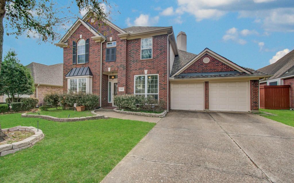 Photo of 12607 Tallwood Crossing Lane, Houston, TX 77041 (MLS # 98908613)