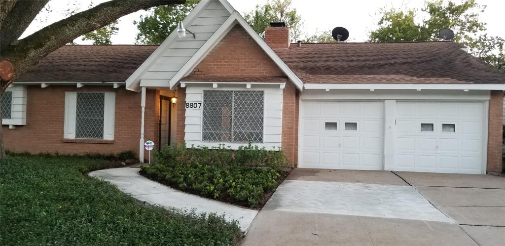 Photo of 8807 Leader Street, Houston, TX 77036 (MLS # 97669794)