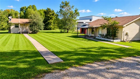 Photo of 13632 Montgomery Road, Santa Fe, TX 77510 (MLS # 10907535)