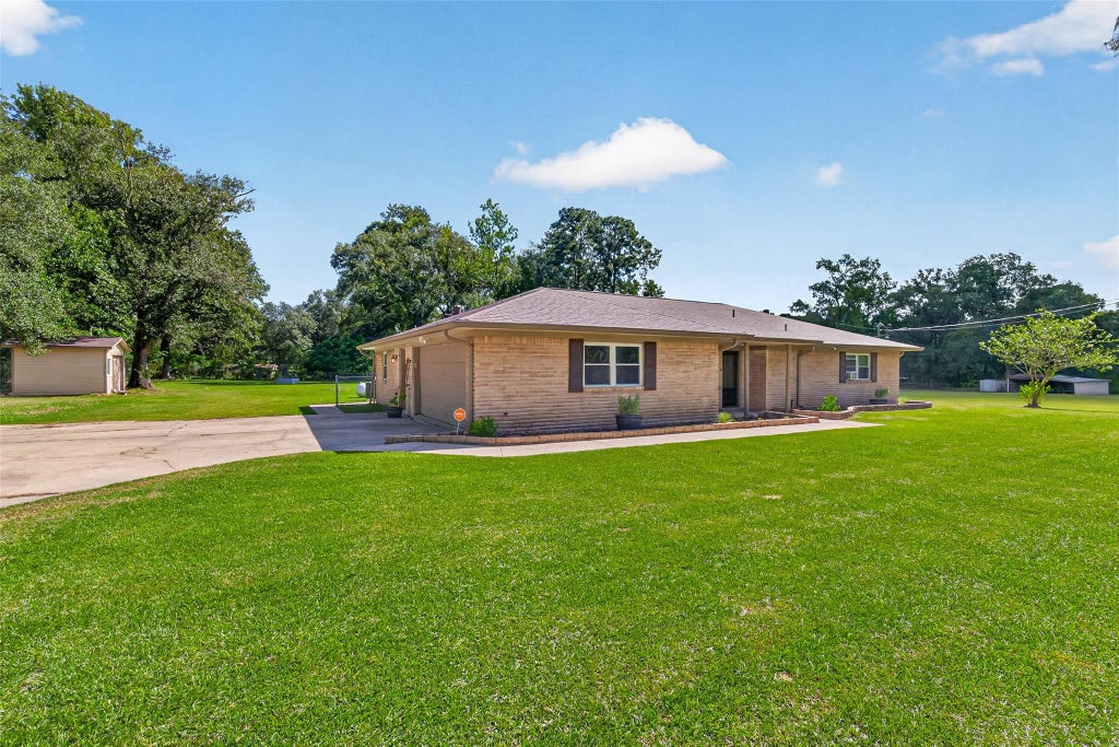 Photo of 68 White Oak Drive, New Caney, TX 77357 (MLS # 93887903)
