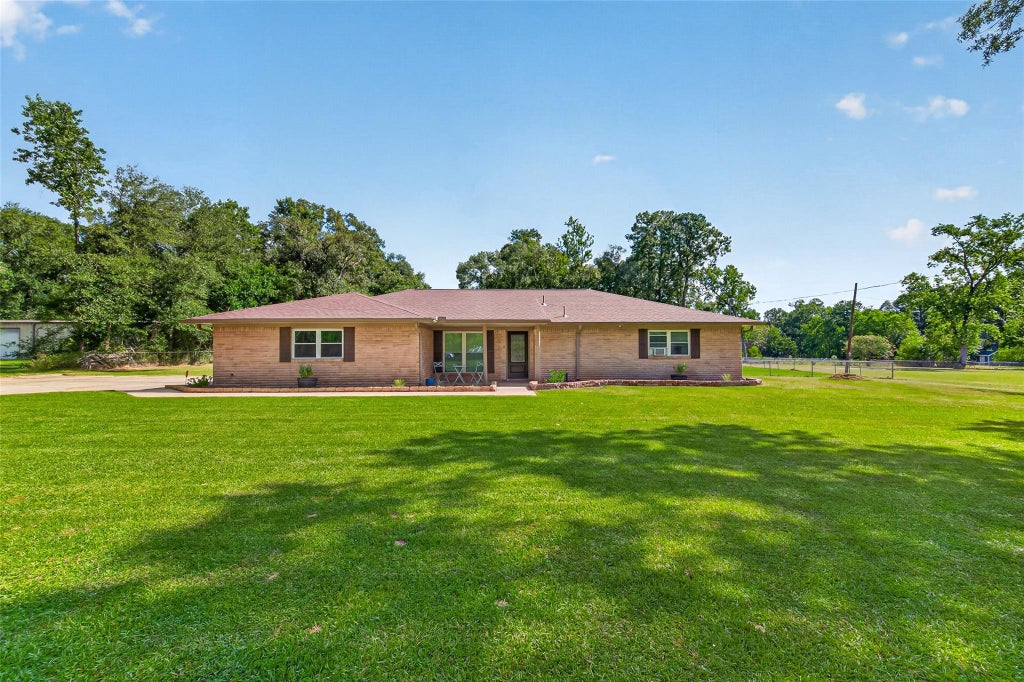 Photo of 68 White Oak Drive, New Caney, TX 77357 (MLS # 93887903)