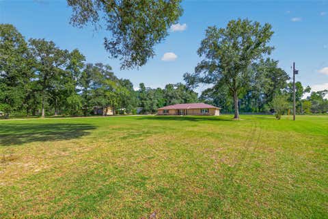 Photo of 68 White Oak Drive, New Caney, TX 77357 (MLS # 93887903)